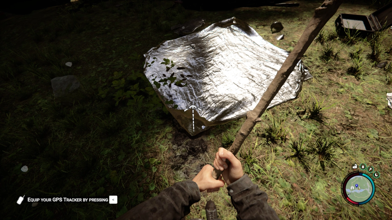 Makeshift shelter with tarp and stick, plus an expanded wood storage area